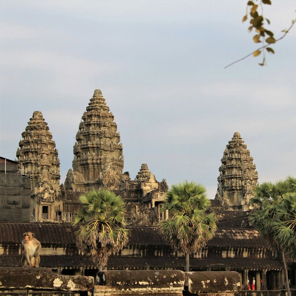 The towers of Angkor Wat rising above the temple causeway in Siem Reap
