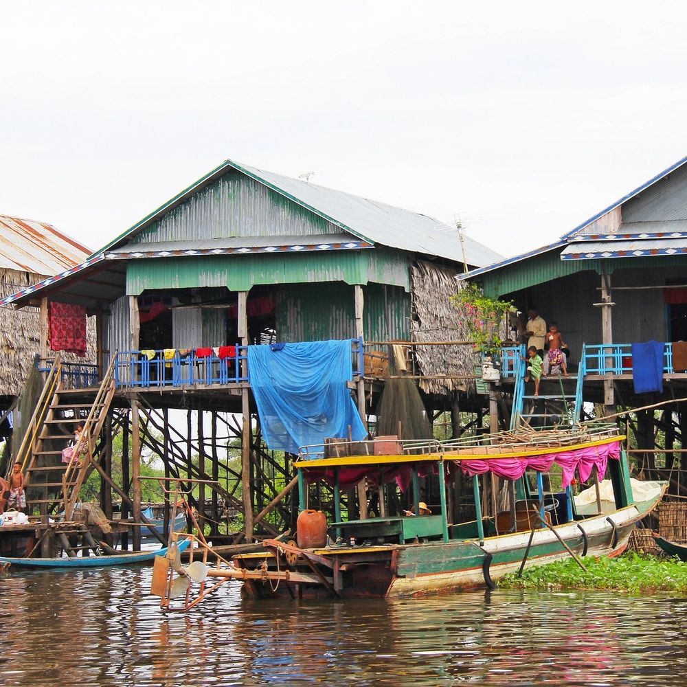 Stilted wooden houses of a floating village on Tonlé Sap lake