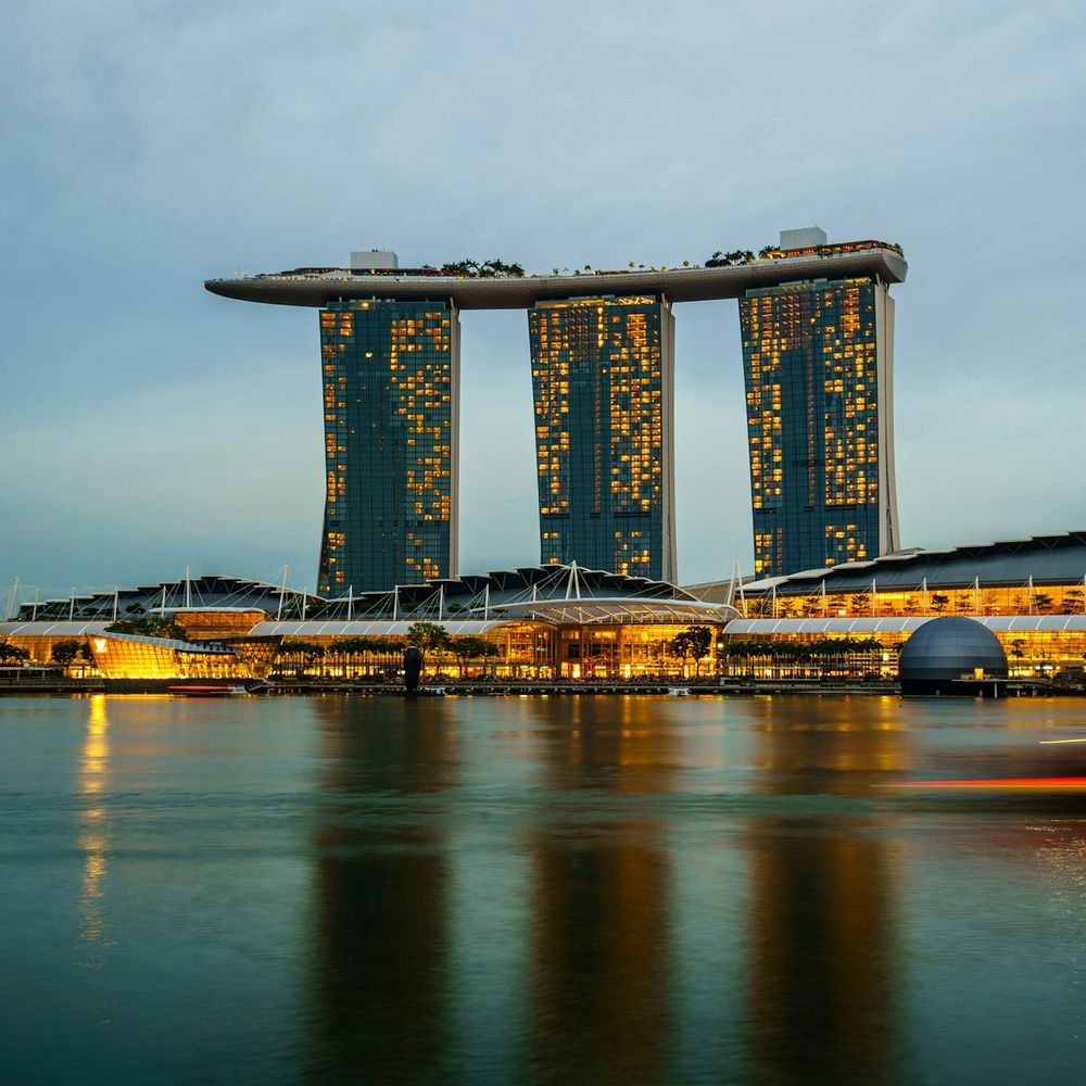 Marina Bay Sands reflected in the water at dusk