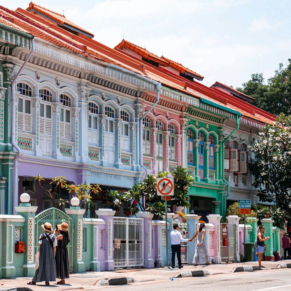 Pastel-coloured Peranakan shophouses with ornate facades on Koon Seng Road