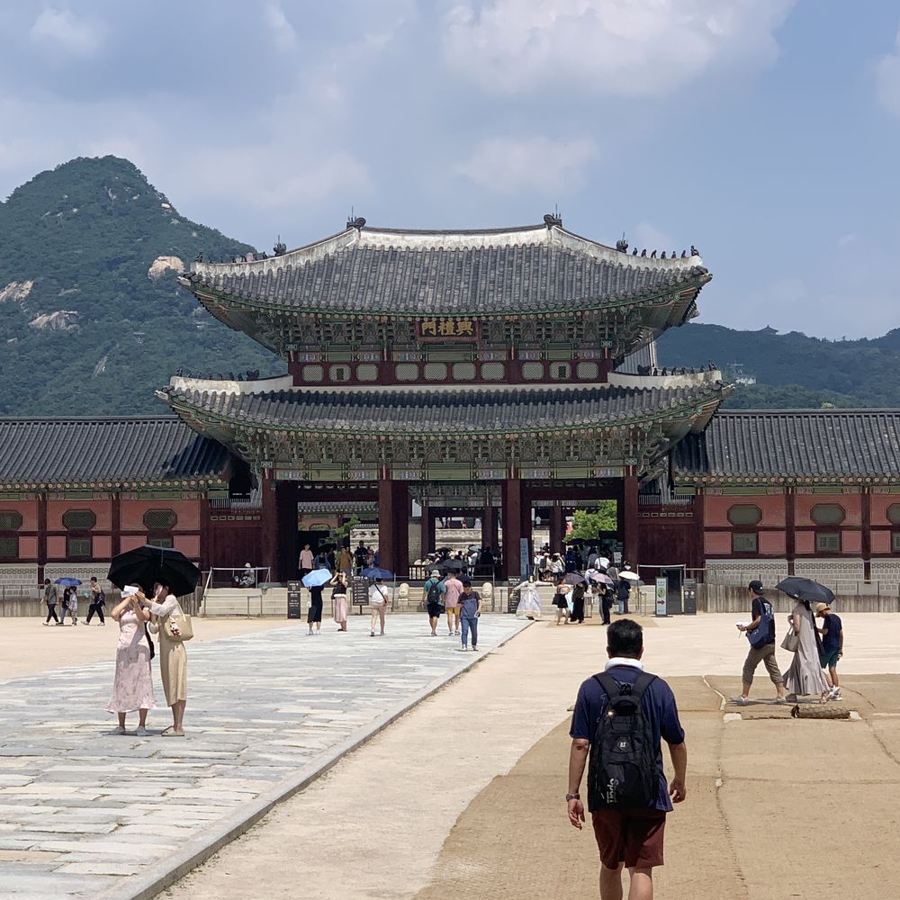 Gwanghwamun Gate of Gyeongbokgung Palace with mountains behind, Seoul